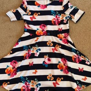 This is a floral dress It’s cute and perfect.